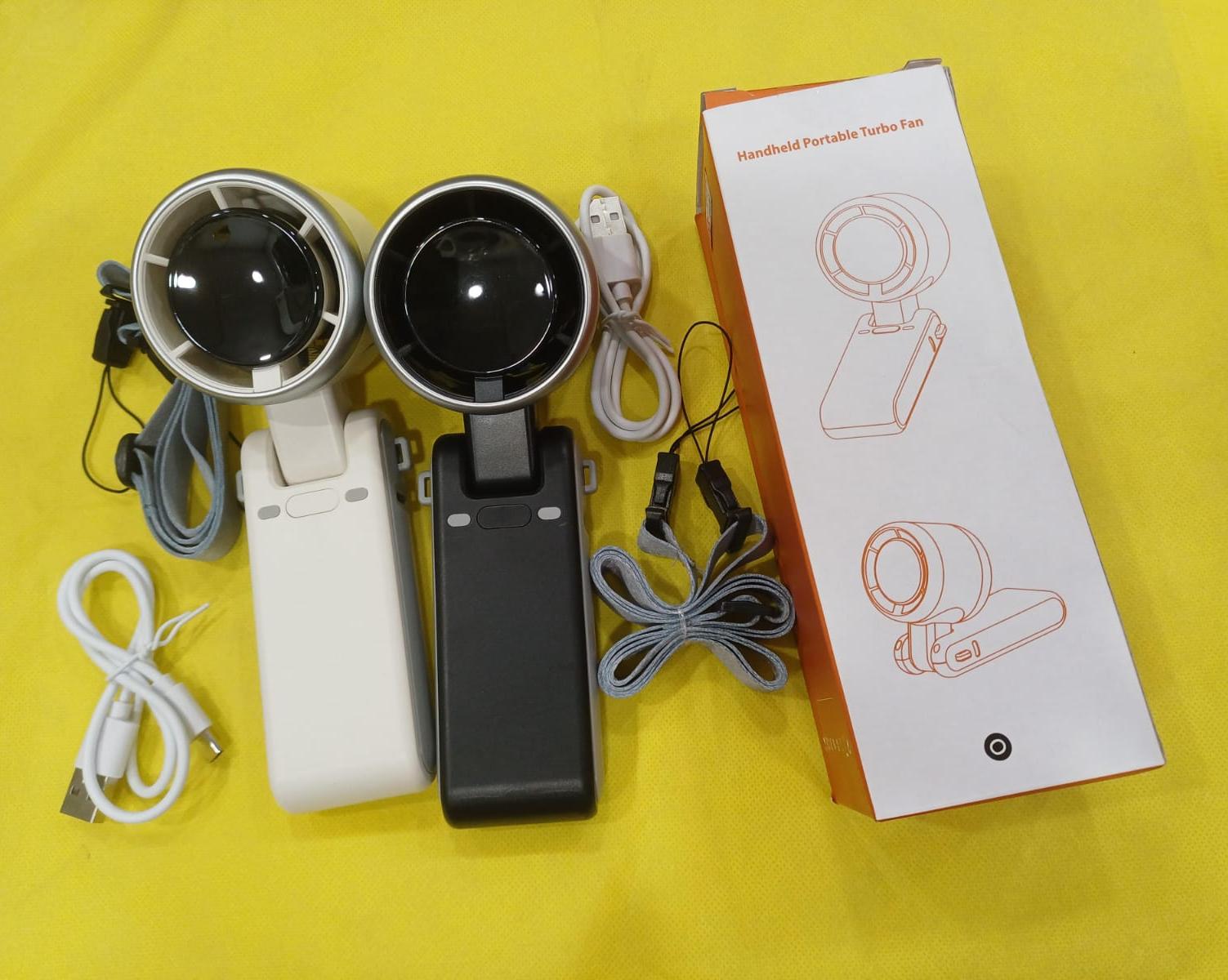 Portable Handheld Turbo Cooling Fan (White or black).